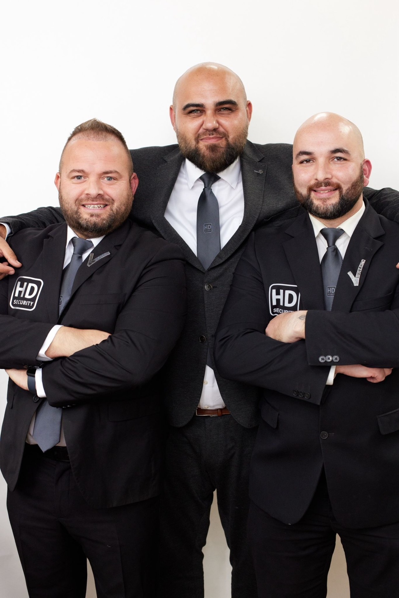 Team HD Zorgbeveiliging — Hasan Dagdeviren met collega's in HD-tenue